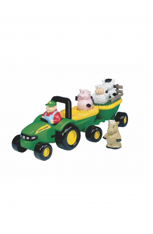 Muzikale tractor met aanhanger en dieren