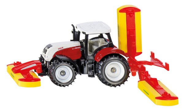 Steyr met Pöttinger maai combinatie